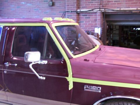 1988 Ford C-350 (Centurion Conversions) - 1988 Ford C-350 (Centurion Conversions) undergoing bodywork with masking tape applied.