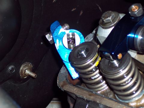 1963 Ford Galaxie - Close-up view of engine valve train components, including a blue rocker arm and valve springs.