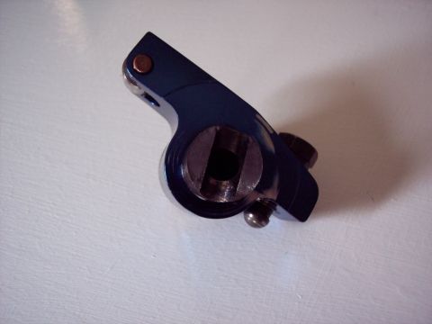 1963 Ford Galaxie - Close-up of a single blue painted rocker arm, likely for an engine.