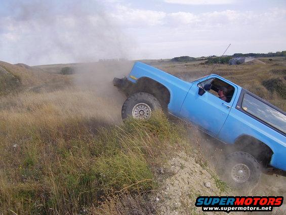 Blue 1989 Chevrolet Blazer driving off-road