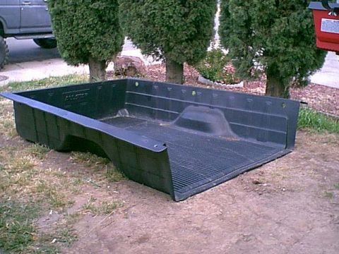 1983 Ford Bronco - I wanted to cover the gap left but the lift so i used a stock ford truckbed liner (free from Matt)