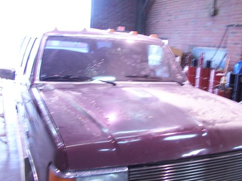 1988 Ford C-350 (Centurion Conversions) - Front view of a truck's hood and grille, showing signs of wear and tear.