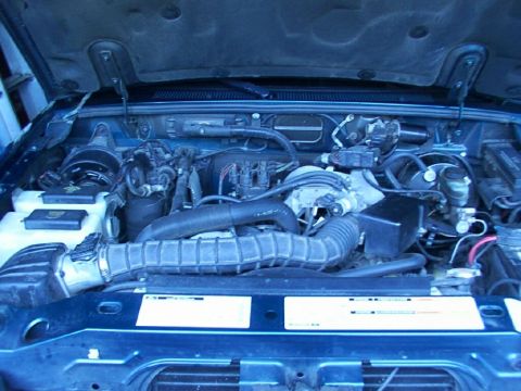 1998 Ford Ranger - Only photo under the hood, It's clean, been well maintained, runs only synthetic oil and gets about 23 mpg for the commute.