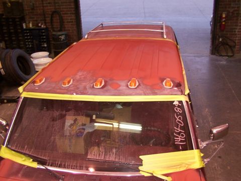 1988 Ford C-350 (Centurion Conversions) - Roof of a 1988 Ford C-350 (Centurion Conversions) being prepped for paint, showing marker lights and roof rack.