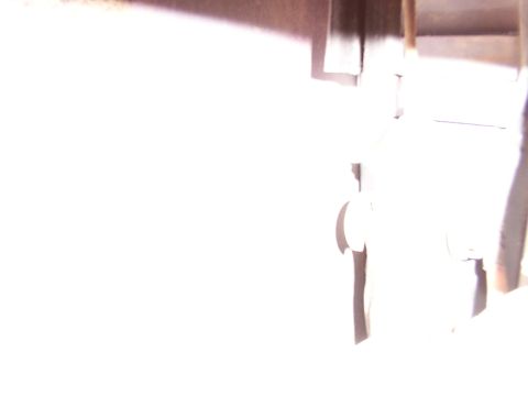 1988 Ford C-350 (Centurion Conversions) - A close-up view of a door lock motor component.