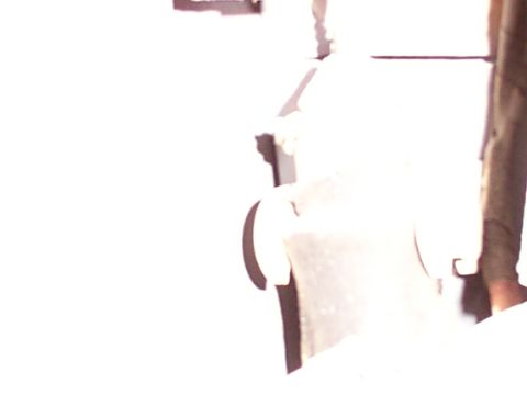1988 Ford C-350 (Centurion Conversions) - Close-up view of a door lock motor component, likely from a vehicle.