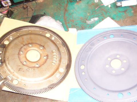 1988 Ford C-350 (Centurion Conversions) - Two flywheels are shown, one with visible rust and markings, the other clean and painted.