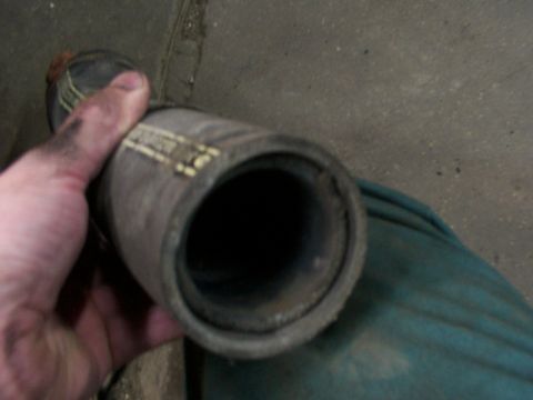 1988 Ford C-350 (Centurion Conversions) - Close-up of a rubber hose, possibly for automotive use.