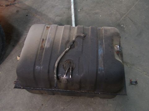 1988 Ford C-350 (Centurion Conversions) - Fuel tank with fuel pump assembly, likely from a truck or van.