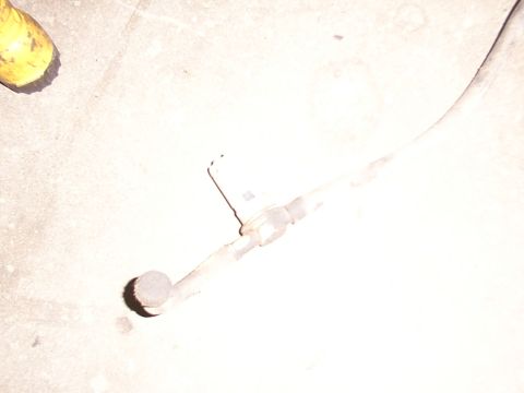 1988 Ford C-350 (Centurion Conversions) - Fuel line fitting with hose, likely from a vehicle's fuel system.