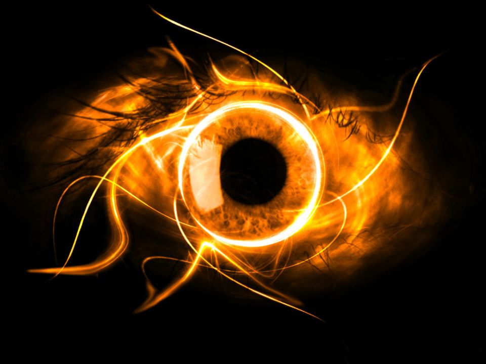 Abstract fiery eye with black background and "SUPERMOTORS www.supermotors.net" text