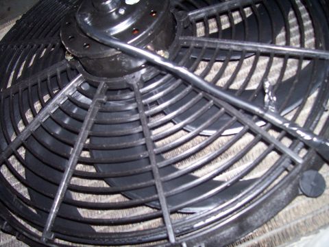 1985 Ford Bronco - Close-up view of an electric cooling fan assembly, likely for a vehicle's radiator system.