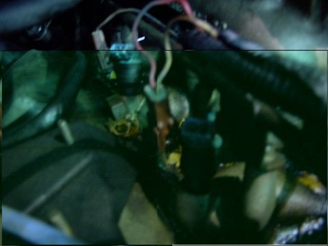 1988 Ford C-350 (Centurion Conversions) - Close-up view of engine injectors and associated wiring harness.
