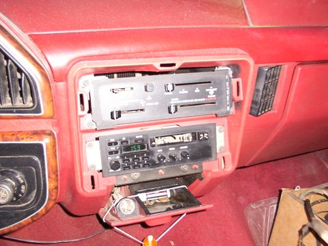 1988 Ford C-350 (Centurion Conversions) - Dashboard interior with climate controls and radio removed, showing wiring and interior components.