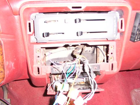 1988 Ford C-350 (Centurion Conversions) - Dashboard interior showing exposed wiring and climate control panel removed.