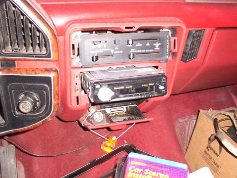 1988 Ford C-350 (Centurion Conversions) - Dashboard of a 1988 Ford C-350 (Centurion Conversions) with the original radio removed for a new stereo installation.