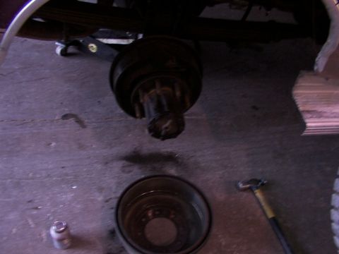 1988 Ford C-350 (Centurion Conversions) - Rear brake drum and hub assembly, likely undergoing maintenance or inspection.