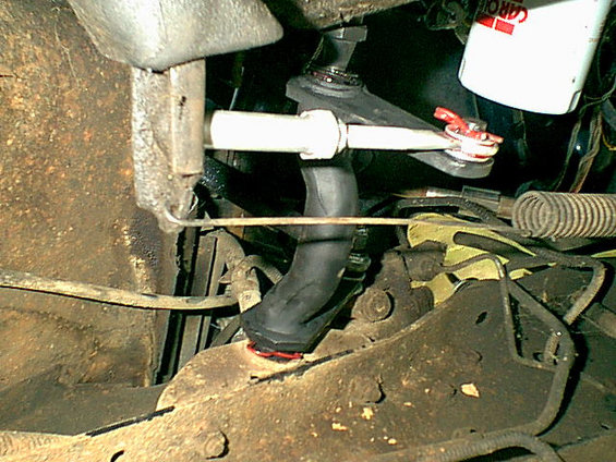 Here is the connection to the throw out arm.