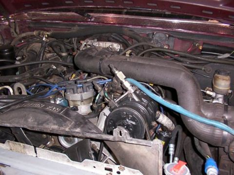 1988 Ford C-350 (Centurion Conversions) - A close-up view of a vehicle's engine bay, showing various components and wiring.