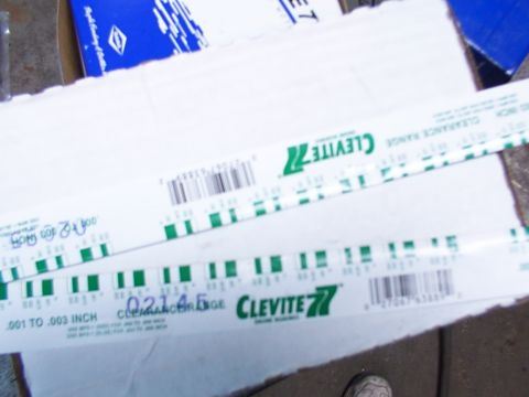 1988 Ford C-350 (Centurion Conversions) - Clevite plastigage strips are used to measure engine bearing clearance.