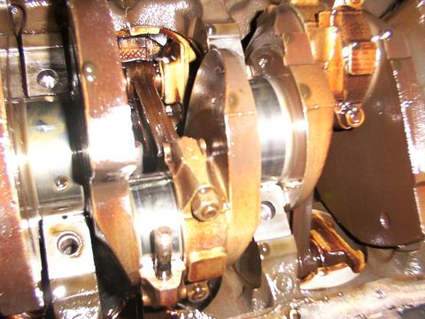1988 Ford C-350 (Centurion Conversions) - This is a close-up view of an engine's internal components, including the crankshaft and connecting rods.