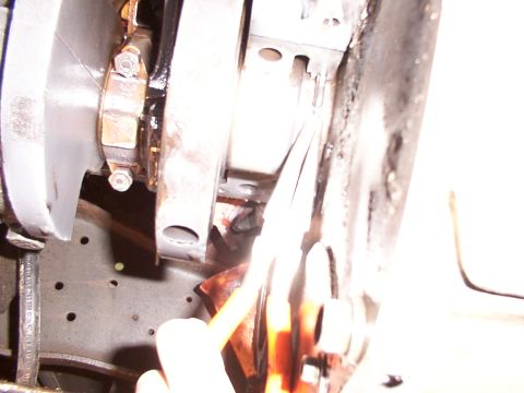 1988 Ford C-350 (Centurion Conversions) - Close-up view of engine components, possibly during repair or inspection.