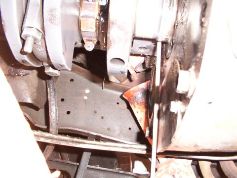 1988 Ford C-350 (Centurion Conversions) - Close-up view of engine crankshaft and connecting rod assembly, showing mechanical components and wear.