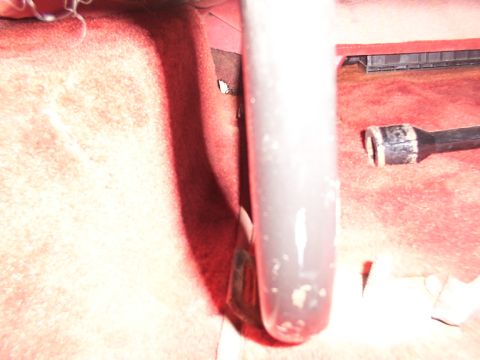1988 Ford C-350 (Centurion Conversions) - Interior view showing a metal support and carpet, with a socket wrench nearby.