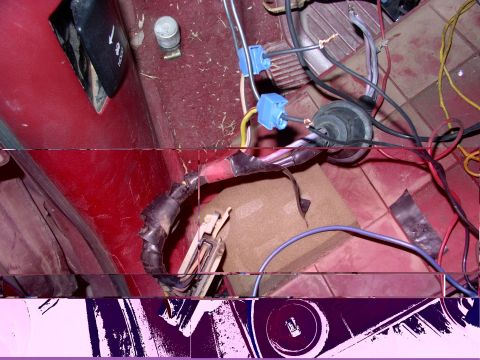 1988 Ford C-350 (Centurion Conversions) - Interior wiring harness with multiple connectors and taped sections visible.