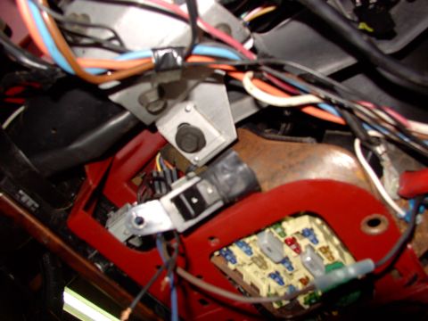 1988 Ford C-350 (Centurion Conversions) - Close-up of the complex wiring system and fuse panel located within the vehicle's interior.