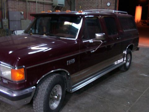 1988 Ford C-350 (Centurion Conversions) - This 1988 Ford C-350 Centurion Conversions SUV features prominent running boards along its side.