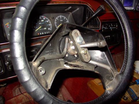 1988 Ford C-350 (Centurion Conversions) - Close-up of the steering column assembly in a 1988 Ford C-350 (Centurion Conversions), showing mechanical components.