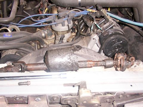 1988 Ford C-350 (Centurion Conversions) - Steering shaft component, likely removed for repair or replacement.