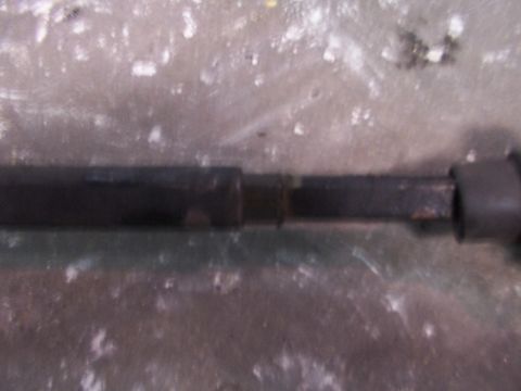 1988 Ford C-350 (Centurion Conversions) - Close-up view of a steering sector shaft, showing a connection point.