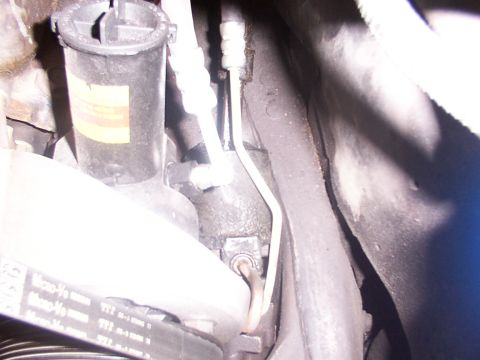 1988 Ford C-350 (Centurion Conversions) - Close-up view of engine components, including the power steering system.