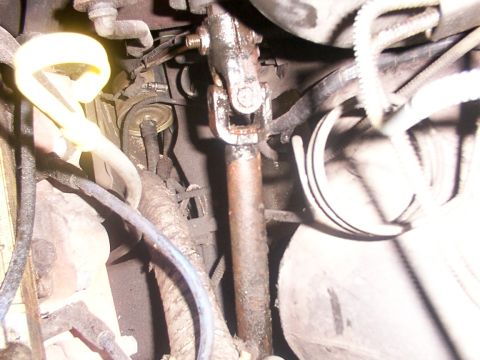 1988 Ford C-350 (Centurion Conversions) - Steering column universal joint, likely from an older vehicle's engine bay.