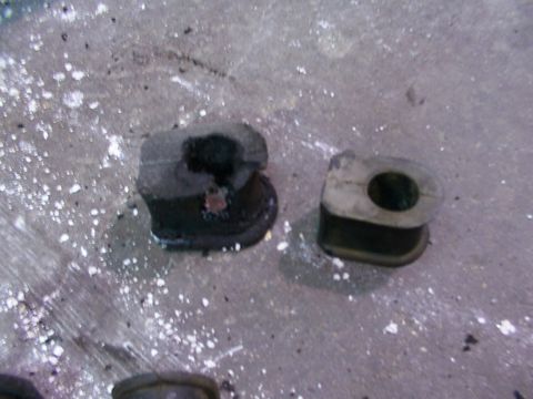 1988 Ford C-350 (Centurion Conversions) - Worn sway bar bushings are shown, indicating a need for replacement.