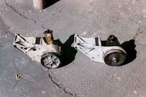 1994 Ford Bronco - new and old next to each other. The new stuff is a bracket and pulley out of 91 van. The pump is a WFL from autozone.
