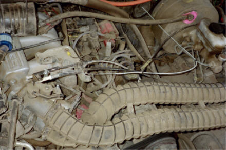 1994 Ford Bronco - The cable is the shiny metal line inline of the brake booster. I twisted the end making aloop, and attached a piece of metal (included in t…