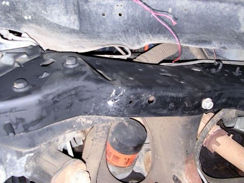 1994 Ford Bronco - drivers side front most rivet removed. it was interfering with the bucket being mounted. It was where all the scratches are