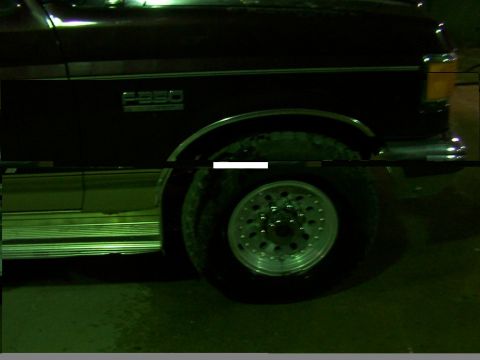 1988 Ford C-350 (Centurion Conversions) - Dark Ford F-250 truck side profile with aftermarket wheels and chrome trim.