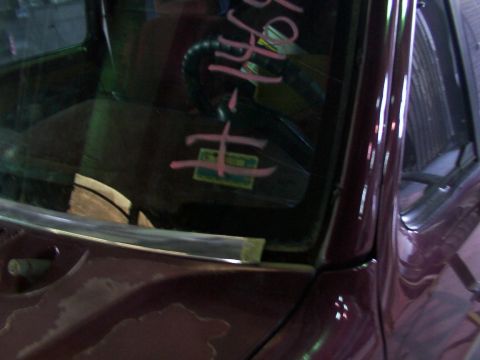 1988 Ford C-350 (Centurion Conversions) - Pink writing is visible on the windshield of a vehicle.