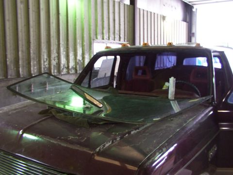 1988 Ford C-350 (Centurion Conversions) - The windshield of a 1988 Ford C-350 (Centurion Conversions) is shown removed from the vehicle.