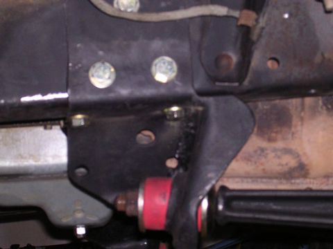 1994 Ford Bronco - passenger side bracket with return fuel line