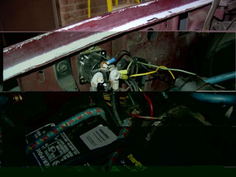 1988 Ford C-350 (Centurion Conversions) - Close-up of a starter solenoid and battery terminals with wiring in a vehicle's engine compartment.