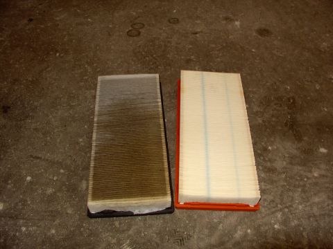 1988 Ford C-350 (Centurion Conversions) - Comparison of a used air filter and a new one, showing the accumulation of dirt.