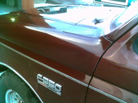 1988 Ford C-350 (Centurion Conversions) - The fender badge clearly reads F-350 Lariat, indicating the model and trim level.