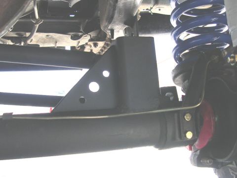 1994 Ford Bronco - rear of lower track bar mount. the holes add at least 15 horse power