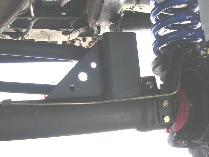rear of lower track bar mount. the holes add at least 15 horse power
