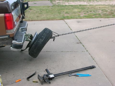 1989 Ford Bronco - My truck plus my roomates truck. Really, no one was hurt during the seperation of my spare and the rim.